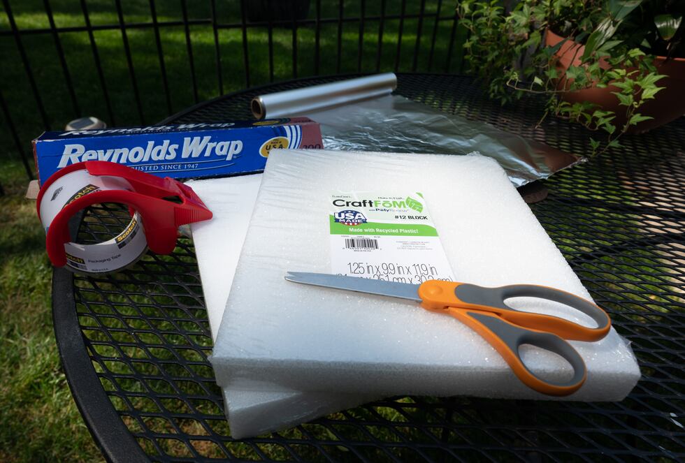 What you need: A 12 by 12 piece of styrofoam, aluminum foil, packaging tape, and scissors.