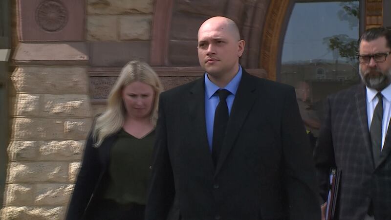 Adam Fravel leaving Winona County Courthouse after pretrial for custody of children.