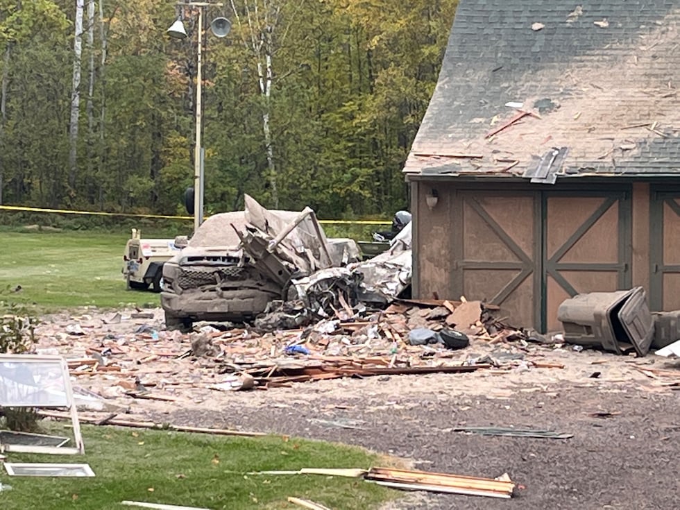 Crews are cleaning up the debris from a deadly plane crash in Hermantown.