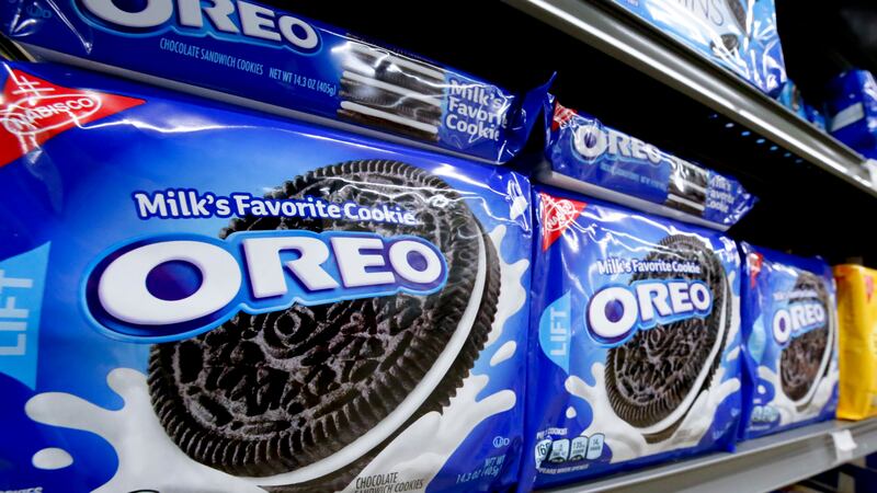 Packages of Nabisco Oreo cookies line a shelf in a market in Pittsburgh, Wednesday, Aug. 8, 2018.