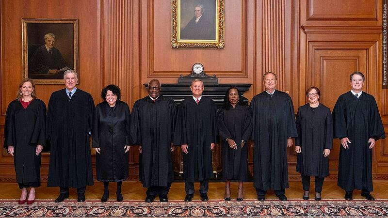 Justices of the U.S. Supreme Court gather for a new term. Justices are, from left, Amy Comey...