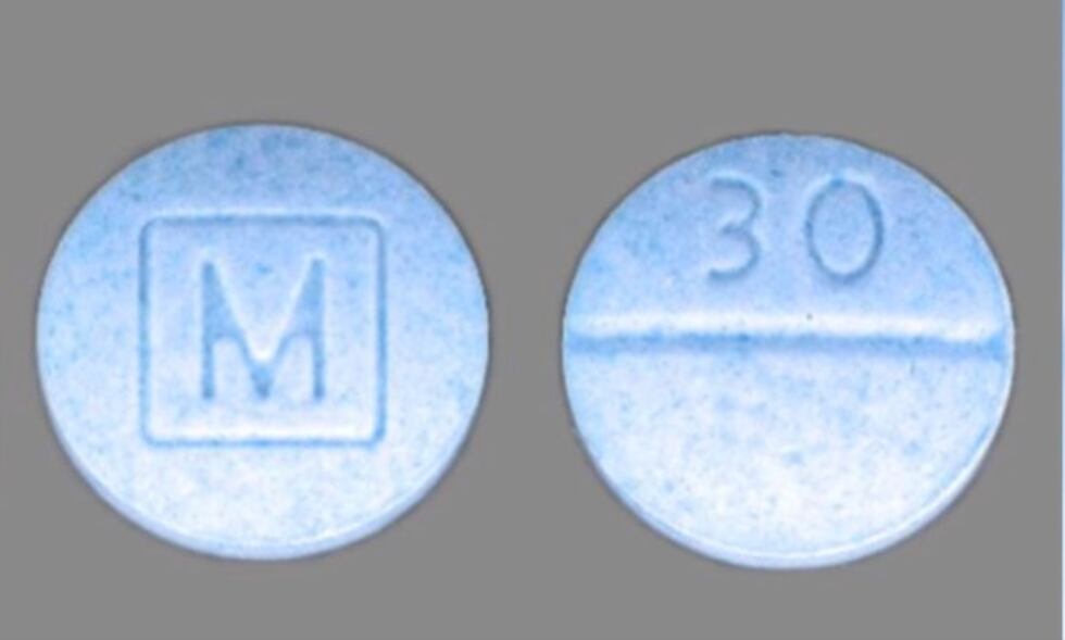M30 Tablets with M on one side and 30 on the opposite.