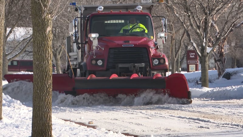 With the heavy snow, proper placement of garbage and recycling carts is important.